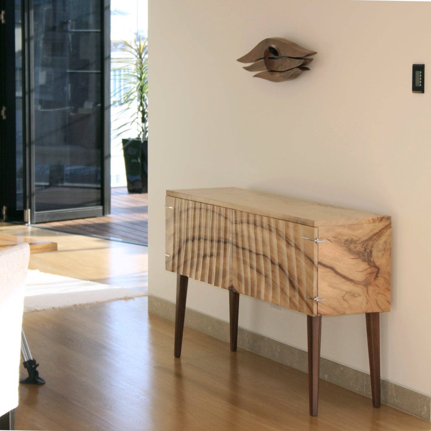 Sheer cabinet in camphor laurel by Deka