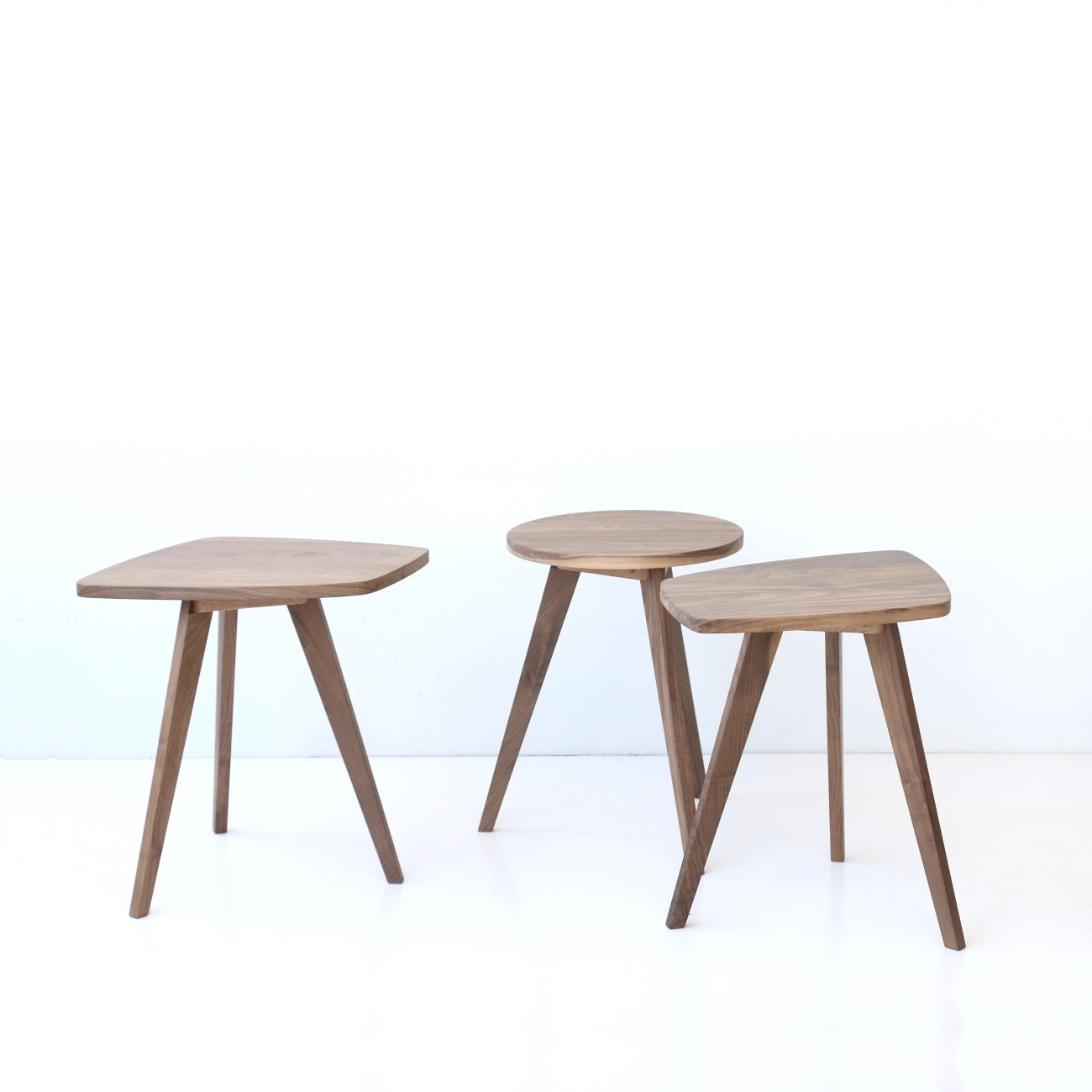 Walnut side tables by Deka