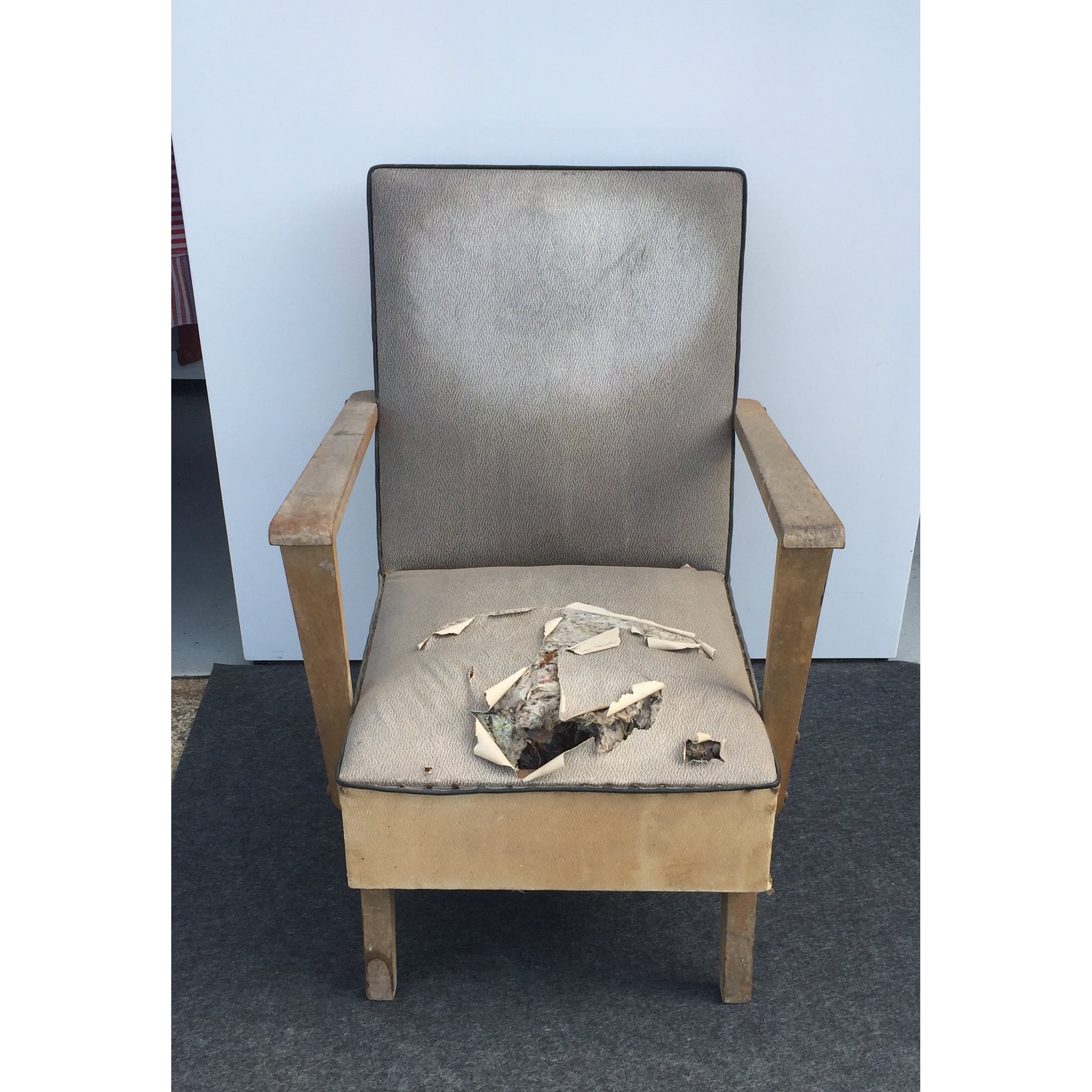 Mid-century armchair before restoration
