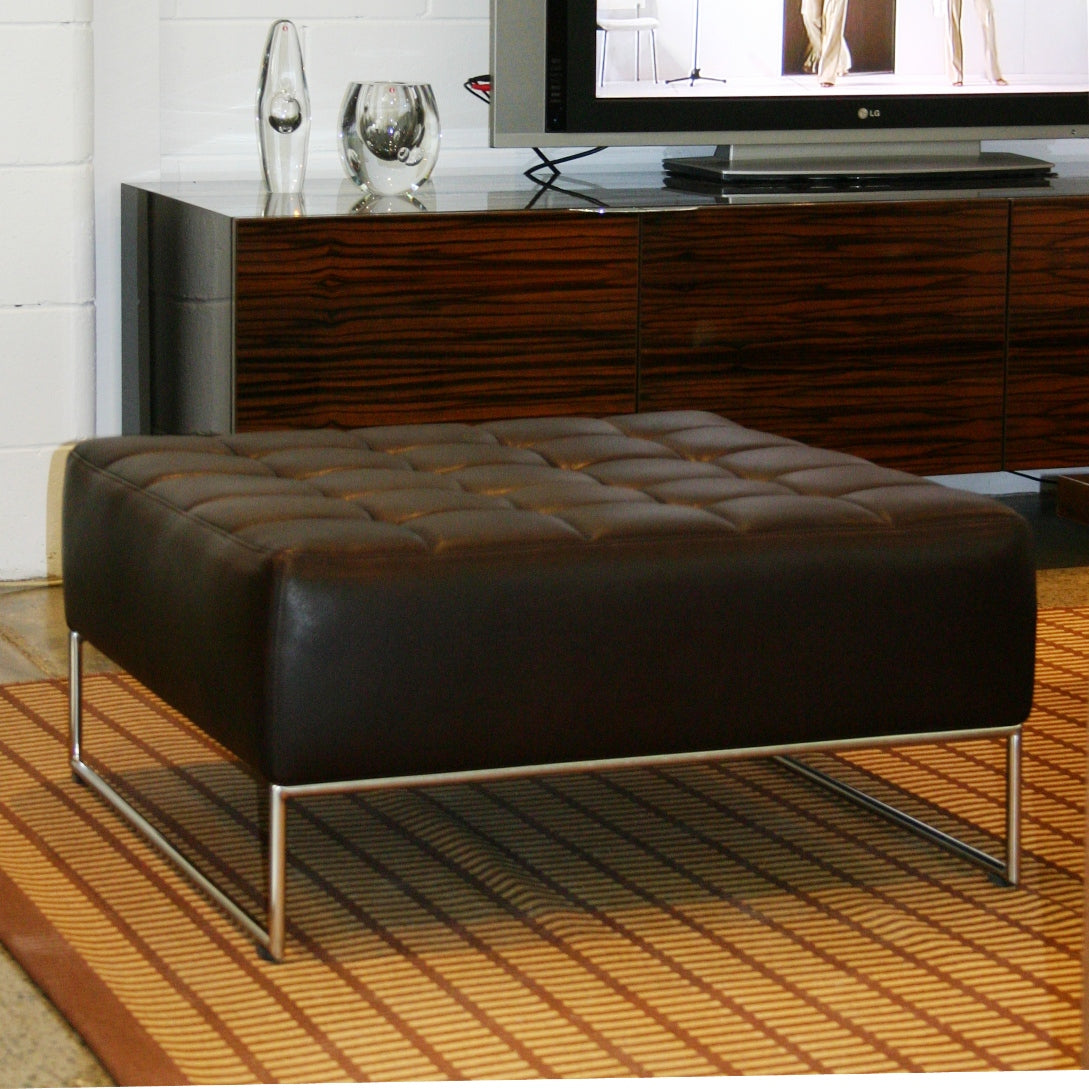 Leather ottoman by Deka